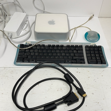 Load image into Gallery viewer, Mac mini for repair or parts. Power supply tested working mouse keyboard Video wire included
